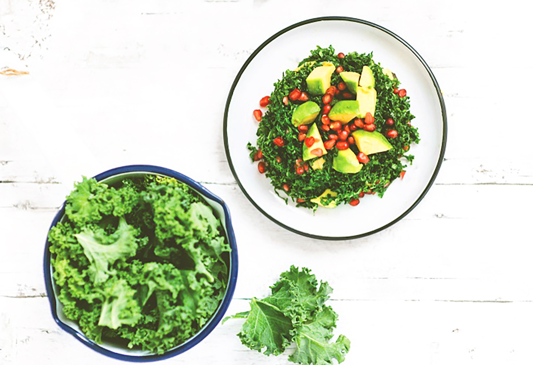 Fresh kale, avocado and pomegranate salad