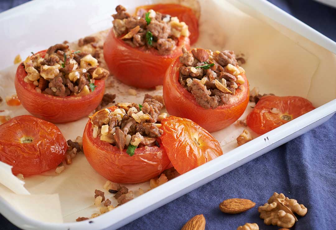 Tomatoes stuffed with nuts, lamb and brown rice